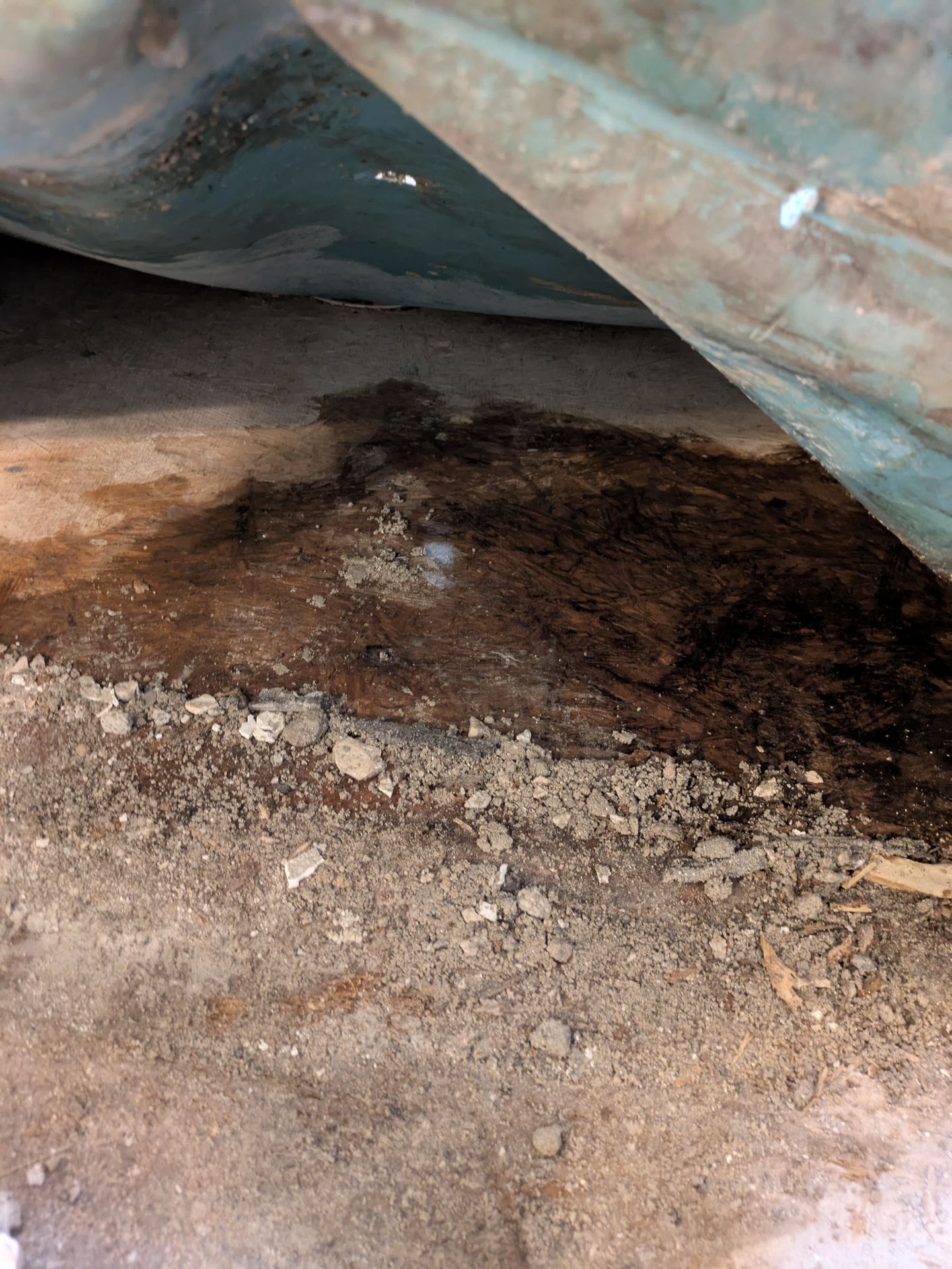 Tracing water leaks under a shower pan in a Normaltown home